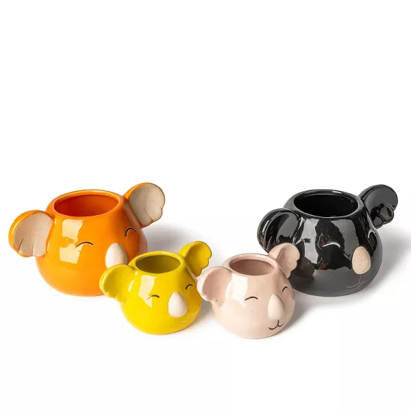 Castiçais de cerâmica em formato de coala